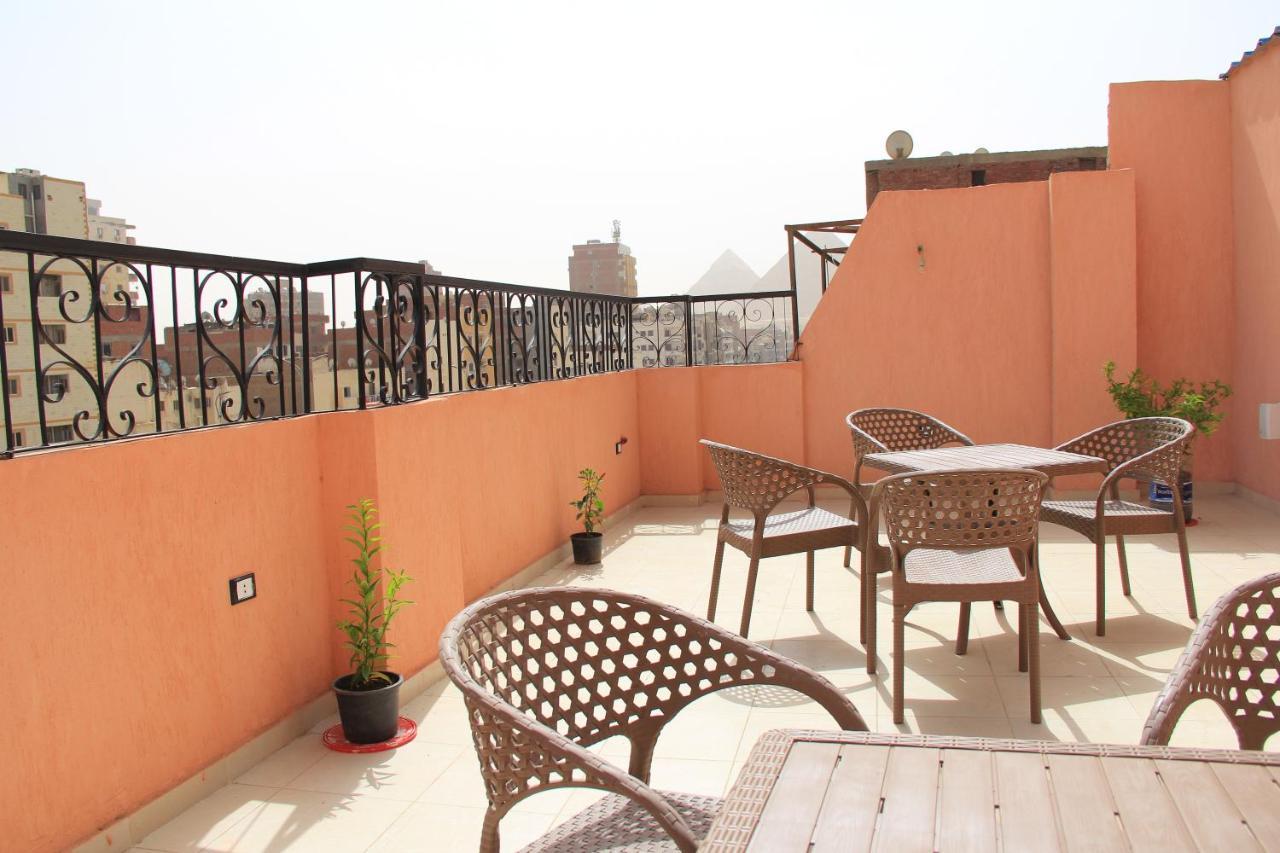 Pyramids Road Guest House Cozy Rooms And Rooftop Breakfast With The Pyramids View Nazlet el-Sisi Luaran gambar